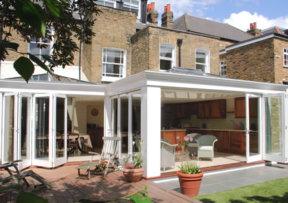 Kitchen and Family Room Orangery with folding sliding doors, London