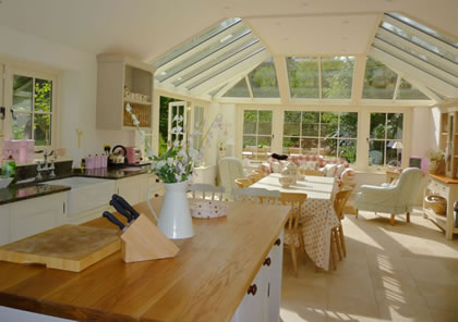 Roof Light and conservatory for kitchen and sitting area on Cotswold house