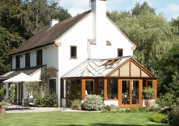 Timber-framed orangery with glazed roof