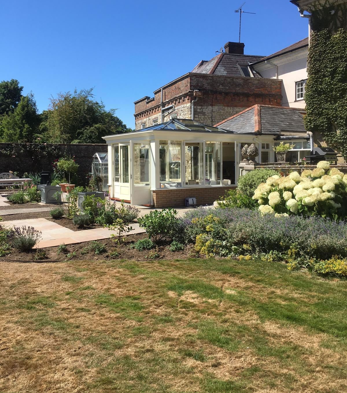 Handcrafted conservatory blending classical and modern design